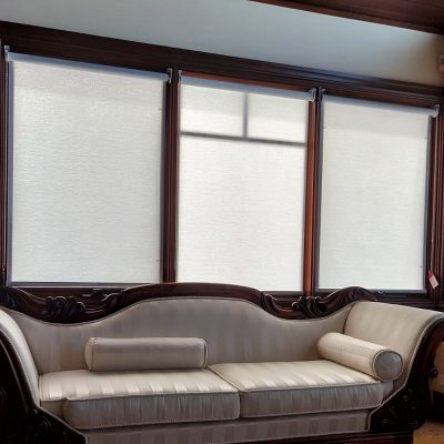 Closed Sheer Roller Blinds in a Living Room